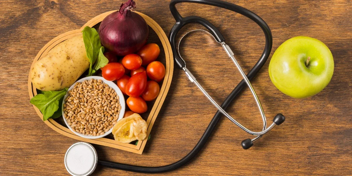 fruits on table with tethoscope